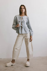 Maggie Peplum Tie Blouse In Light Wash - Final Sale