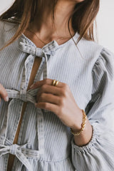 Maggie Peplum Tie Blouse In Light Wash - Final Sale